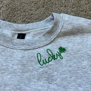 Gildan Gray women’s  Sweatshirt with “lucky” Embroidery in green by neck size XL